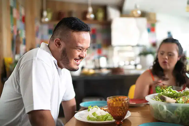 Empowering Weight Loss: A Comprehensive Guide for Individuals with Disabilities 2 Image of a disabled man and balance around nutrition to aid weight loss Hemel Hempstead