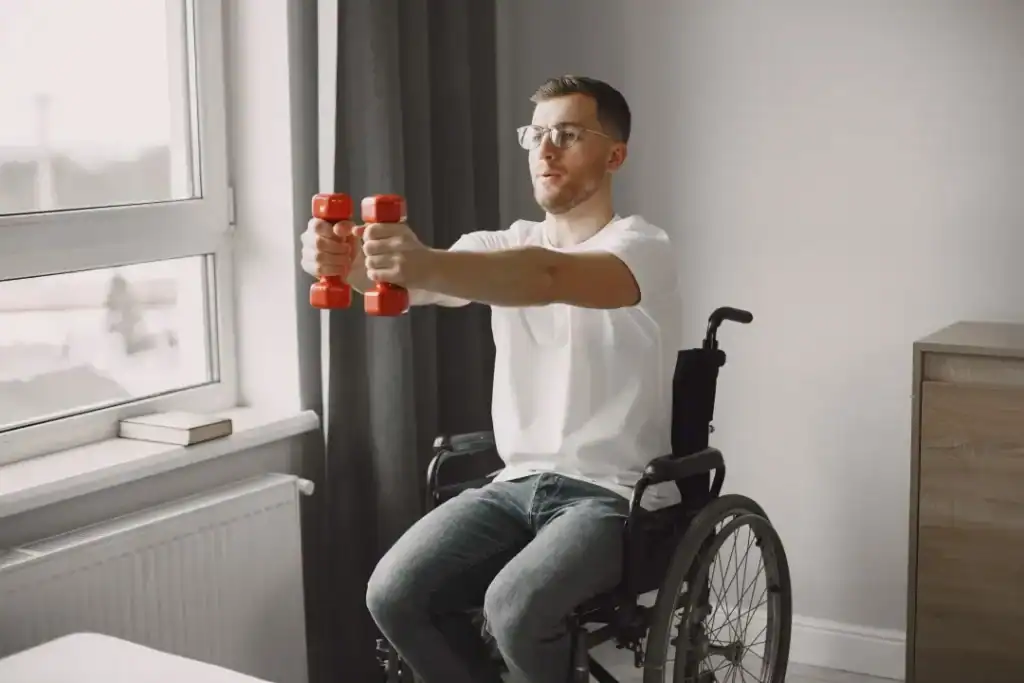 Empowering Weight Loss: A Comprehensive Guide for Individuals with Disabilities 1 Image of man doing exercise in his wheelchair to aid weight loss Hemel Hempstead