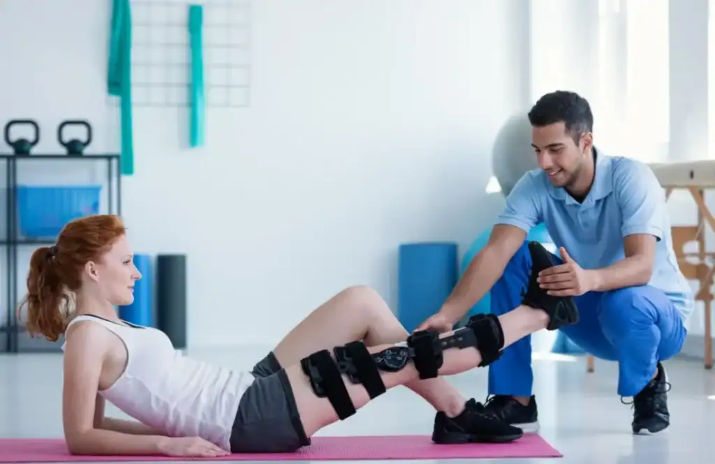 Woman having treatment to help muscle recovery Hemel Hempstead after an injury